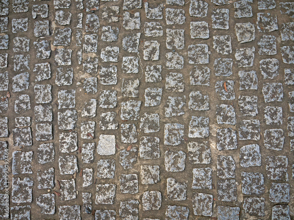 Old Japanese stone bricks paved footpath pattern Old Japanese stone bricks paved footpath pattern