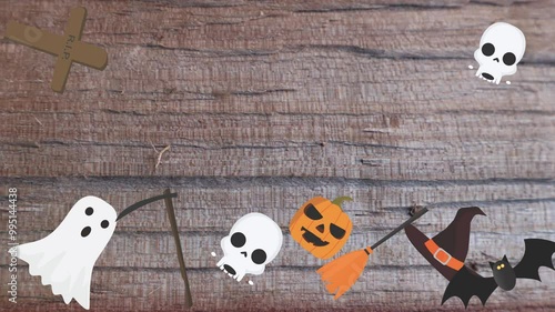 Motion graphics with Halloween elements designs on the wood texture screen photo