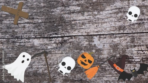 Motion graphics with Halloween elements designs on the wood texture screen photo