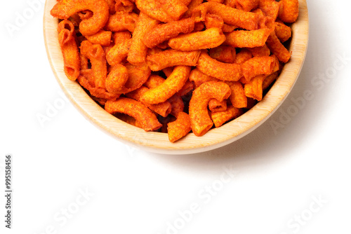 A bowl of crispy, deep-fried macaroni snack coated in spicy red seasoning. Crunchy, savory, and perfect for anytime snacking. Photographed on a white background.