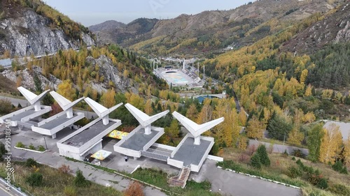 Picturesque mountain gorge and Medeu skating rink in the vicinity of the Kazakh city of Almaty on an autumn day photo