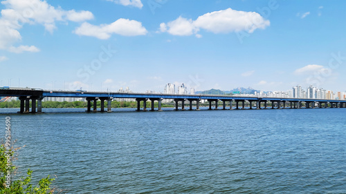 Wallpaper Mural panorama view of the river, Yeouido Hangang River Park, in Seoul, Korea, with a broad bridge, and a cityscape in the backdrop	
 Torontodigital.ca