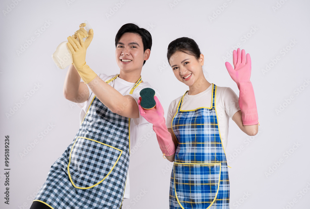 Image of Asian couple posing on white background. Image of Asian couple posing on white background.