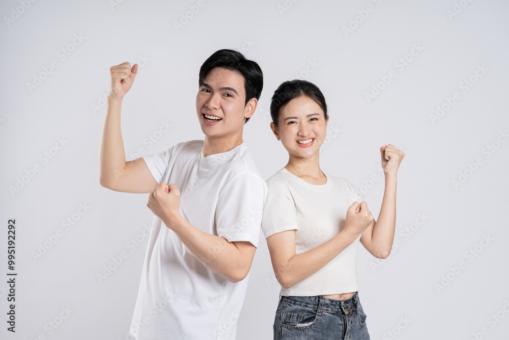 Image of Asian couple posing on white background. Image of Asian couple posing on white background.