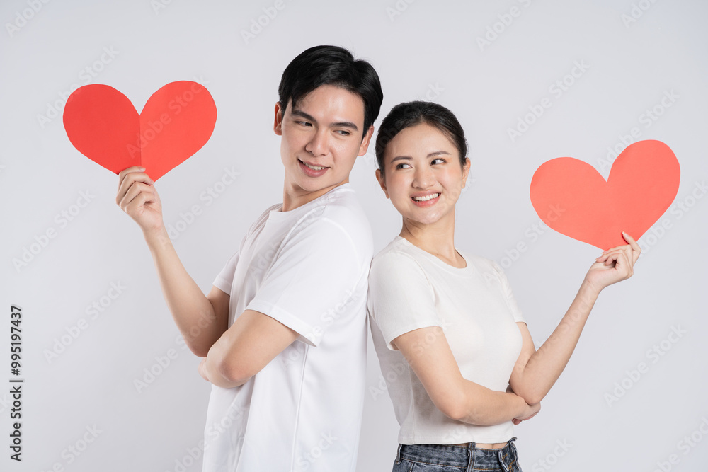 Image of Asian couple posing on white background. Image of Asian couple posing on white background.