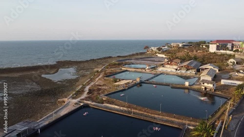 view from above, shrimp ponds near the beach