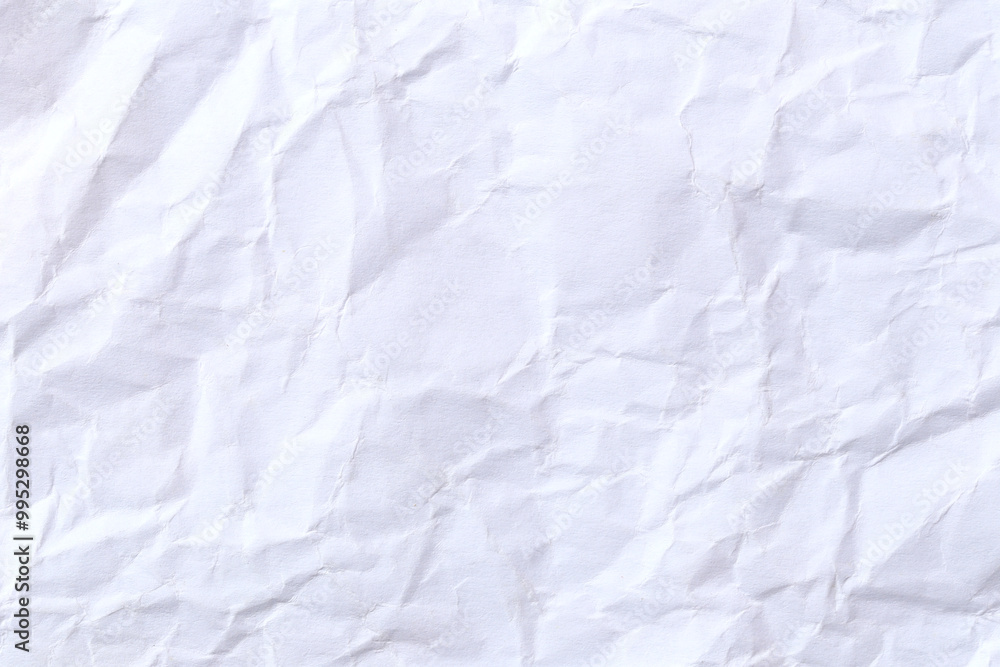 Obraz premium Crumpled White Paper Texture for Backgrounds and Designs