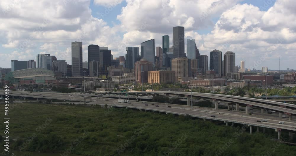 Descending drone shot of downtown Houston and surrounding area Descending drone shot of downtown Houston and surrounding area
