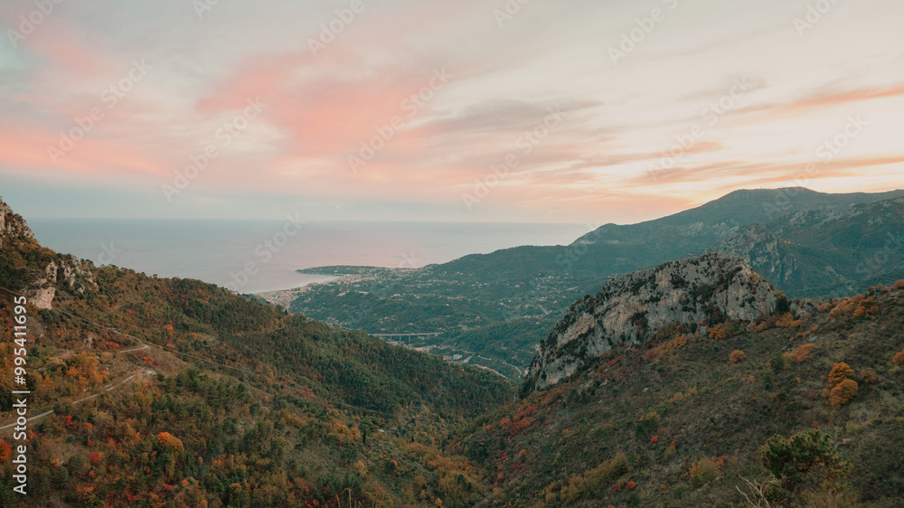 Naklejka premium sunset over the mountains