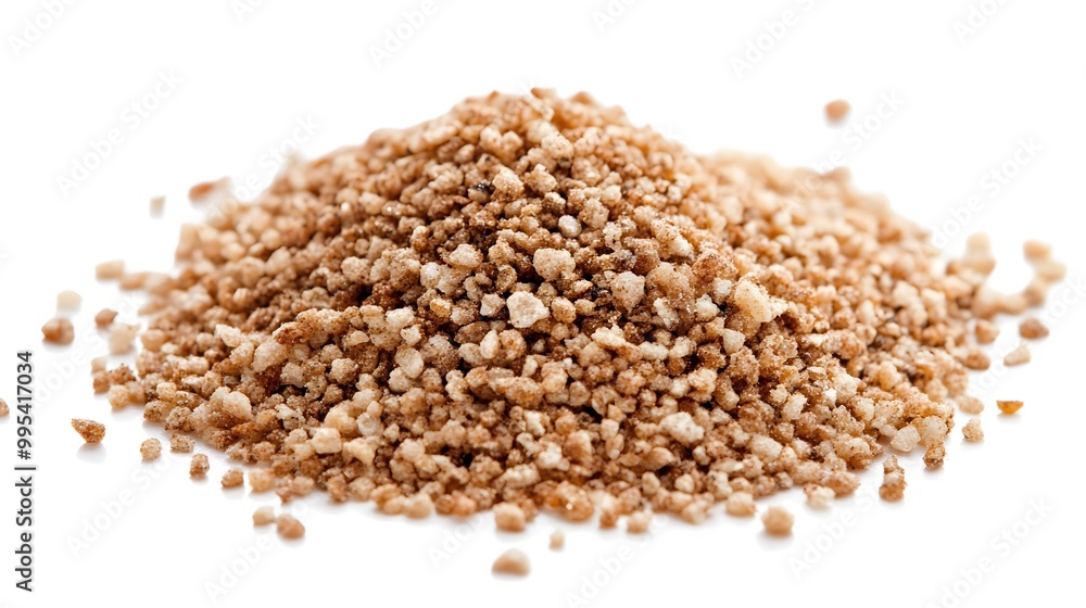 A pile of brown, crunchy, ground almonds isolated on a white background. A pile of brown, crunchy, ground almonds isolated on a white background.