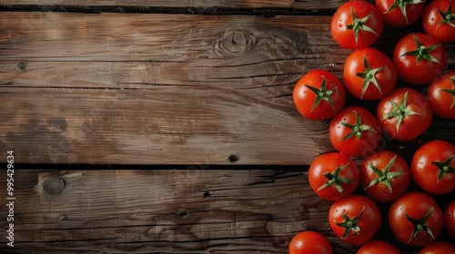 Fresh tomatoes displayed on wooden surface with space for text top view