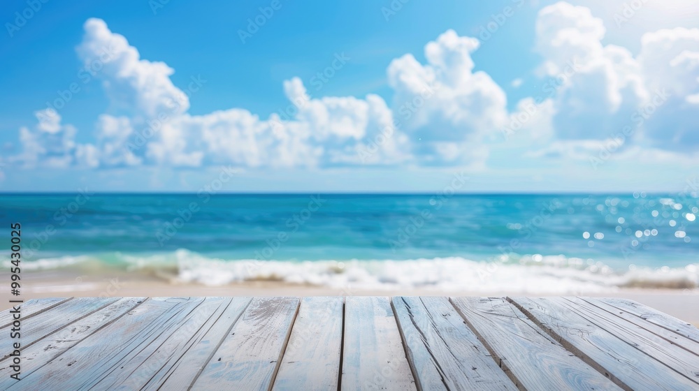 Fototapeta premium White wooden table on blurred blue sea and sky background for summer vacation display