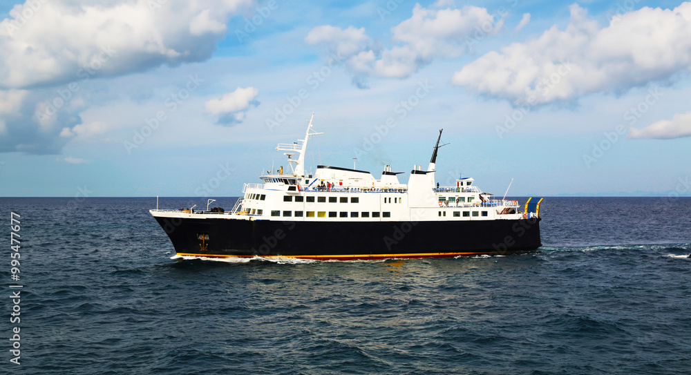 Ferry crossing the Gulf of Naples, set against a vast seascape with dramatic clouds, capturing a tranquil maritime scene Ferry crossing the Gulf of Naples, set against a vast seascape with dramatic clouds, capturing a tranquil maritime scene