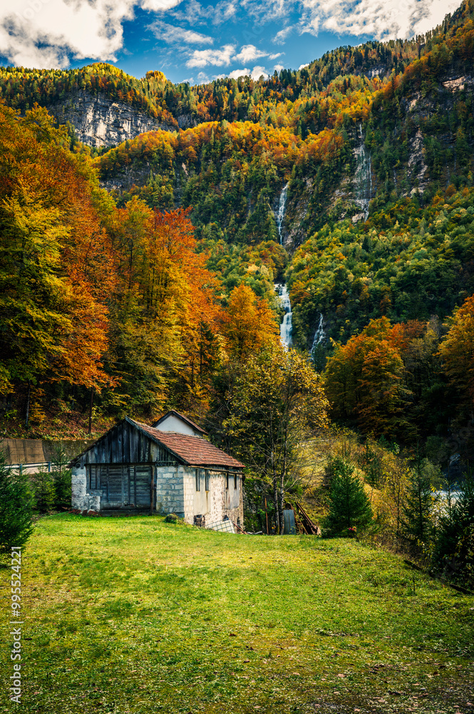 Autumn in Val Raccolana. Between peaks, lakes and streams. Julian Alps and Fontanone di Goriuda Autumn in Val Raccolana. Between peaks, lakes and streams. Julian Alps and Fontanone di Goriuda