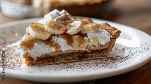 Wallpaper Mural A decadent and indulgent slice of banoffee pie, with a buttery crust, a layer of toffee, fresh bananas, and whipped cream Torontodigital.ca