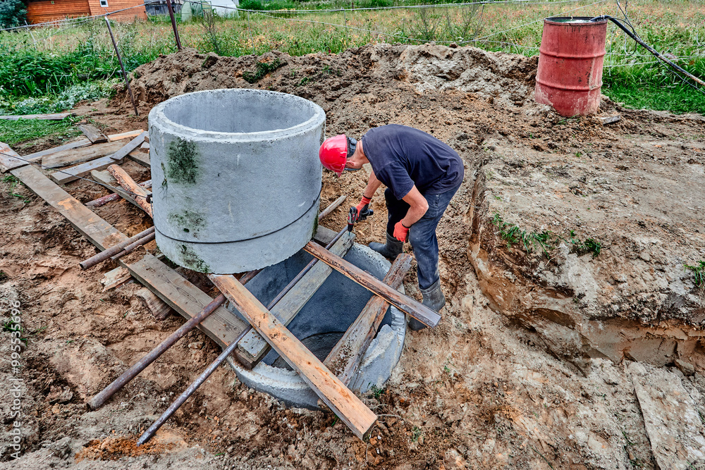 Septic Rings Concrete rings placed on top of each other using roller bed system when ...