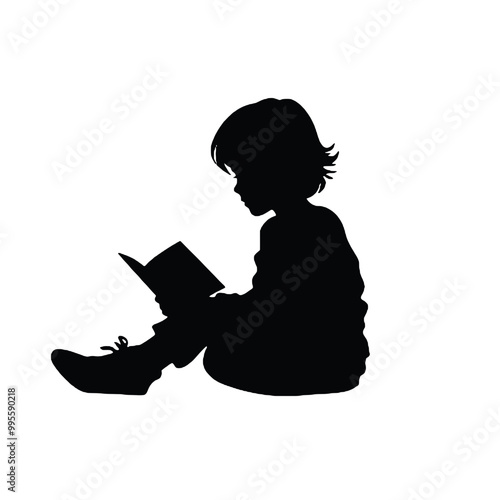 Silhouette of a young person reading a book