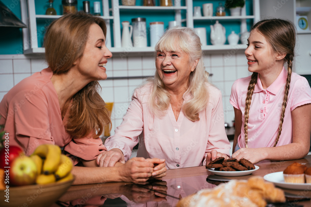 Cincematic image of a senior woman and her daughter baking and preparing food in her beautiful kitchen Cincematic image of a senior woman and her daughter baking and preparing food in her beautiful kitchen