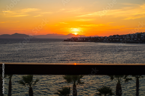 Bodrum, View of the city, mountains and shore of the Aegean Sea with cafes and restaurants at sunset photo