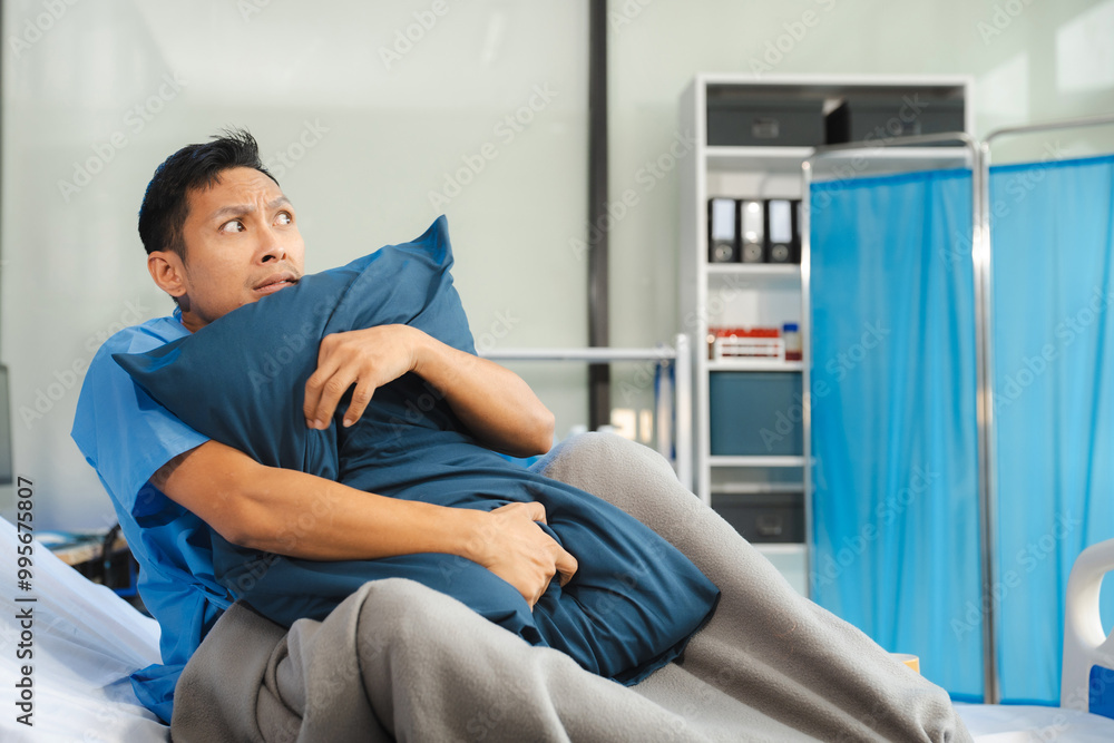 Obraz premium Patient sitting in bed, stressed, bored, loneliness, anxiety/health care and medical.