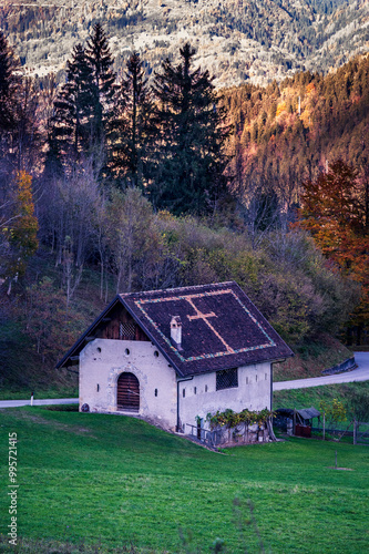 Autumn in Val Degano. Ovaro and its characteristic villages. The house with a hundred windows