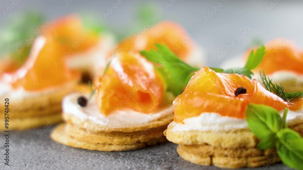 Toasts with cream cheese and smoked salmon neatly aligned. Perfect for catering, buffet food, and healthy meal concepts Toasts with cream cheese and smoked salmon neatly aligned. Perfect for catering, buffet food, and healthy meal concepts