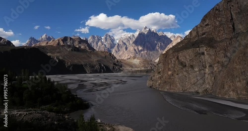 Beautiful Establishing Drone Shot - Hussaini Suspension Bridge. Passu Cones, Pakistan Tourist Destination. Zipline photo