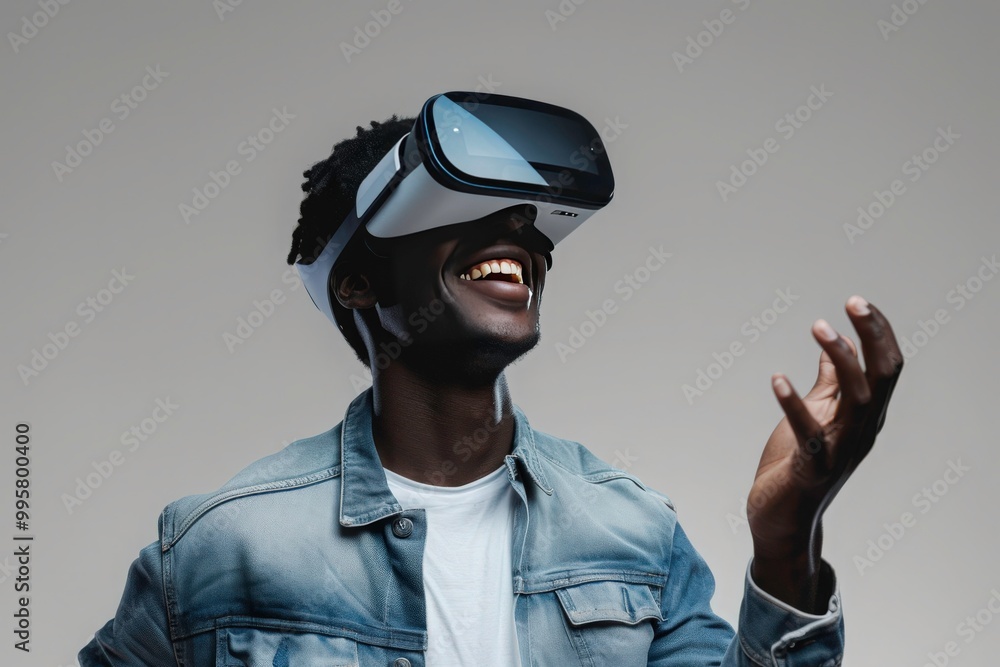 A man wearing a VR headset is smiling. Perfect for technology, virtual reality, gaming, innovation, and futuristic concepts. Generative AI A man wearing a VR headset is smiling. Perfect for technology, virtual reality, gaming, innovation, and futuristic concepts. Generative AI