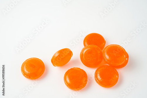 Medical lozenges for relief cough, sore throat and throat irritation isolated on white background