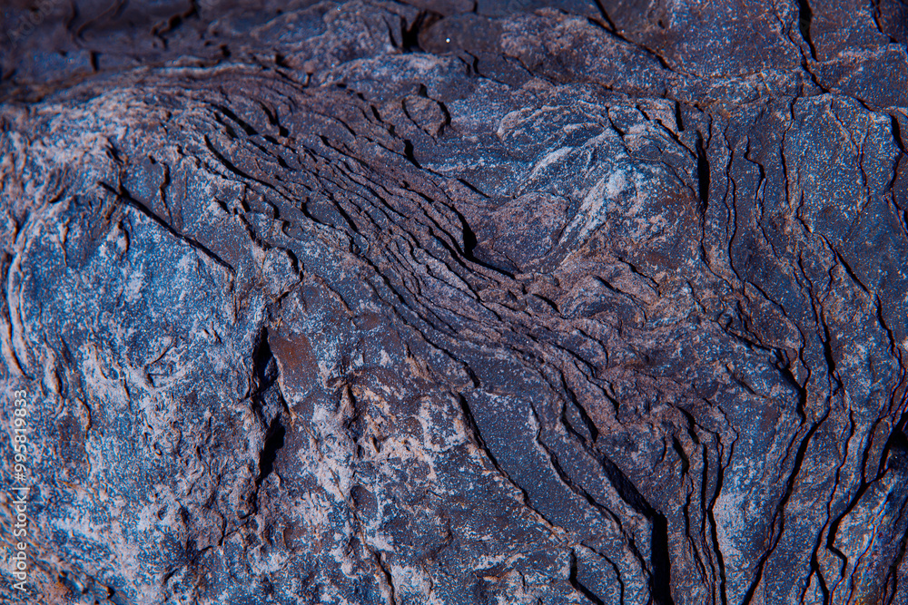 a natural rock of shale ore in cracks. a natural rock of shale ore in cracks.