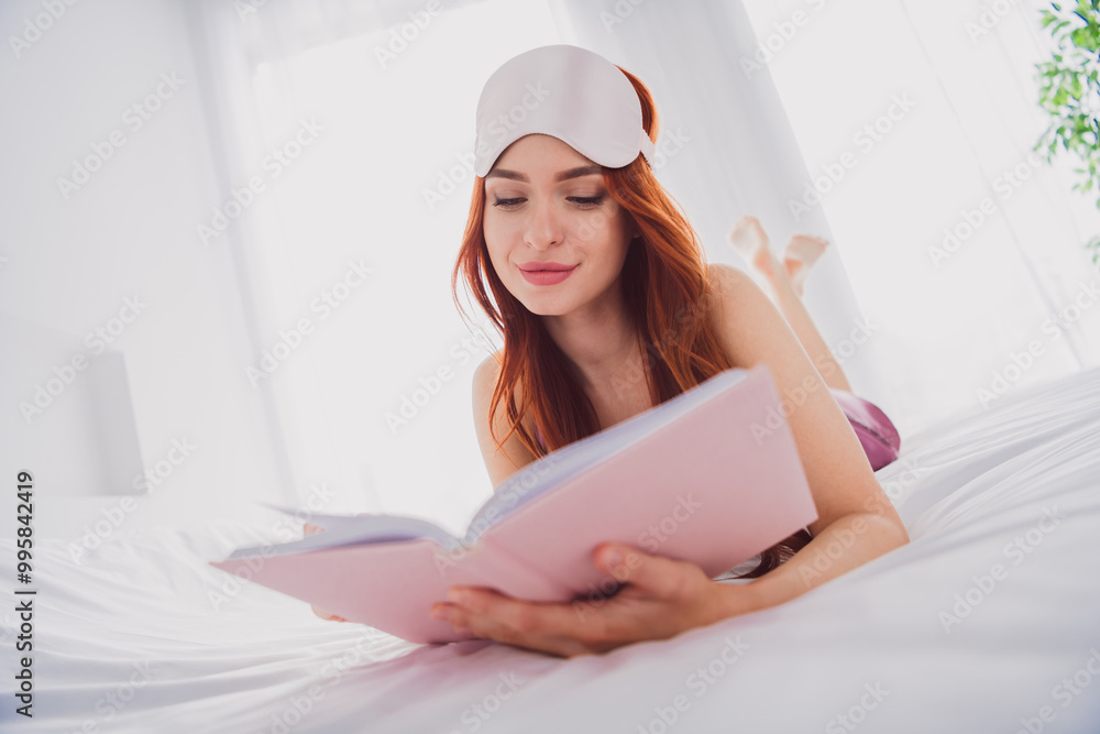 Photo of cute lovely girl lying bed reading book enjoying weekend morning time indoors white light interior Photo of cute lovely girl lying bed reading book enjoying weekend morning time indoors white light interior