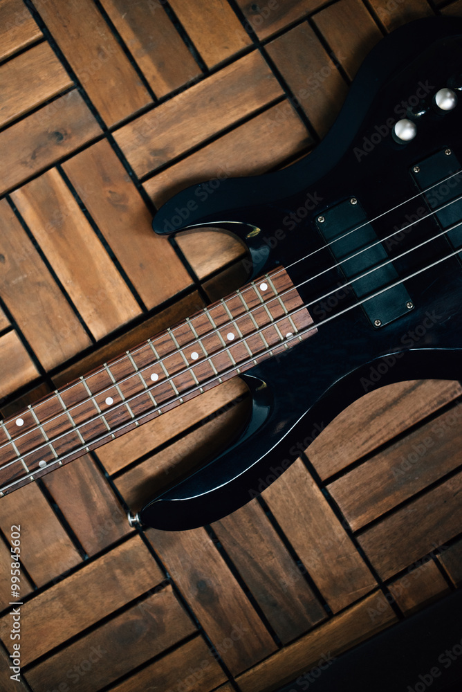electric black guitar neck close up electric black guitar neck close up