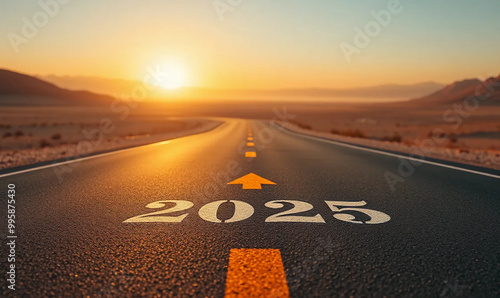 at sunset Road to 2025 with an empty road with written and arrow pointing towards the horizon to represent the future and positivity and success of the new year 2025 in a middle desert way photo