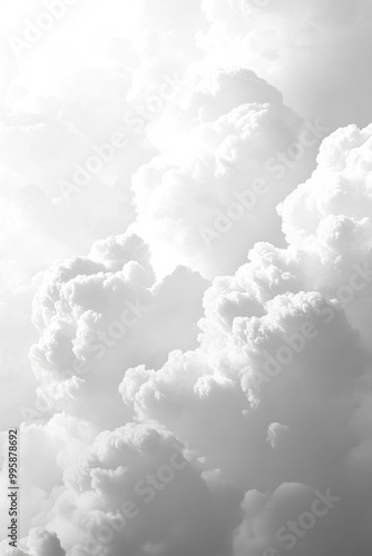 Abstract background featuring a gradient of white and grey clouds