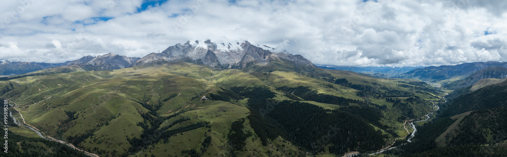 High altitude grassland and snow capped mountain in Sichuan, China High altitude grassland and snow capped mountain in Sichuan, China