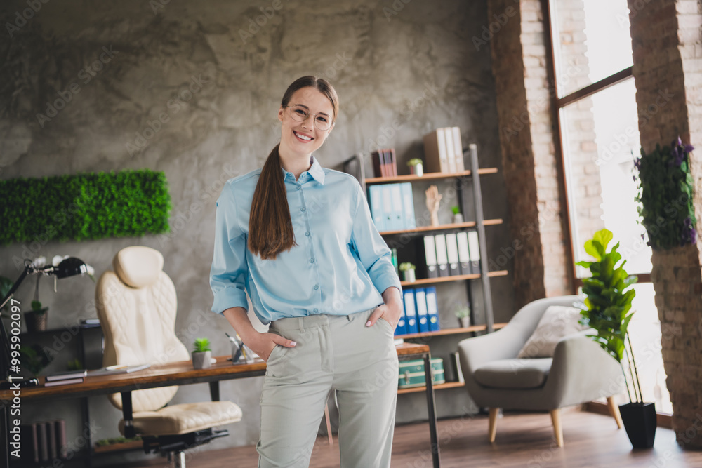 Photo of good mood confident lady specialist dressed shirt smiling indoors workstation workshop Photo of good mood confident lady specialist dressed shirt smiling indoors workstation workshop