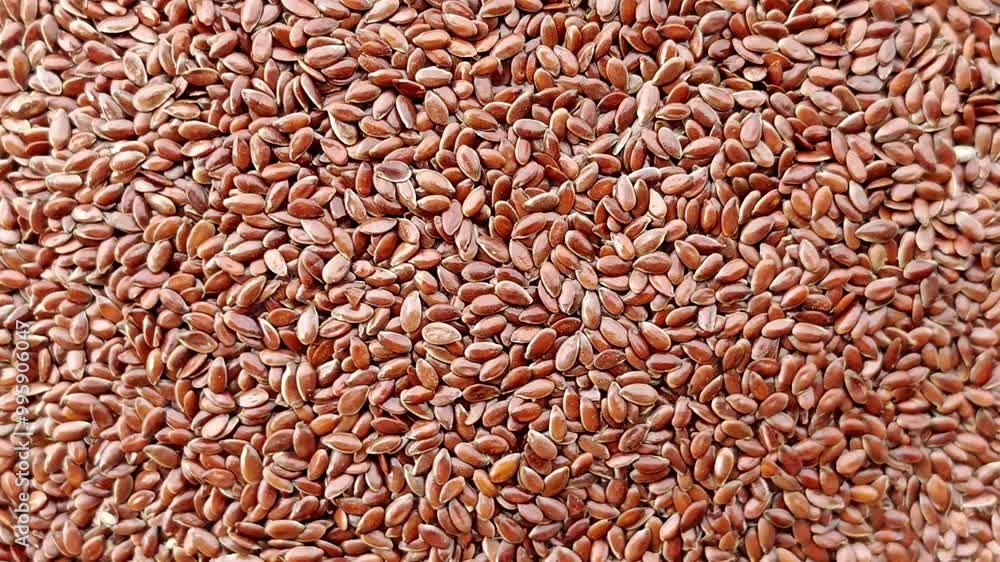 Organic Whole Brown Flax Seeds. Close up of Brown Flaxseed Texture. Organic Whole Brown Flax Seeds. Close up of Brown Flaxseed Texture.
