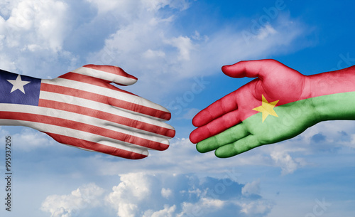 Burkina Faso and Liberia country handshaking with flags, consensus concept international co-operation illustration