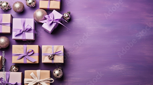 Wallpaper Mural Top view of gifts, bows and Christmas decorations on a purple wooden background Torontodigital.ca