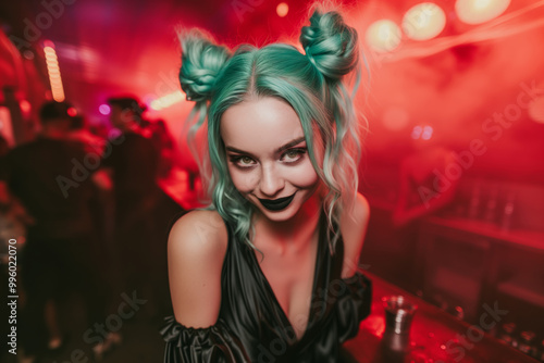 Flirty smiling woman with turquoise hair in double buns and black lipstick, enjoying vibrant night out in lively nightclub with red lighting, speed dating hookup with escort lady of the night