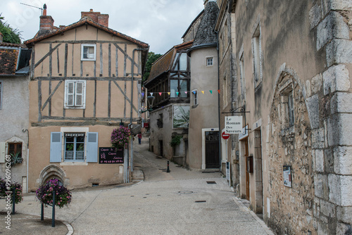 Narrow medieval street in Montmorillon France photo