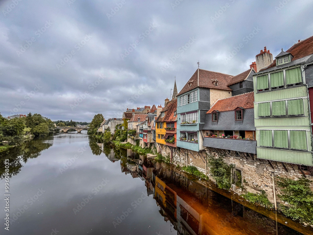 Colorful houses along the river Creuse in France