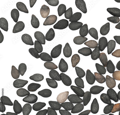 Black organic sesame seeds isolated on white background, macro and top view