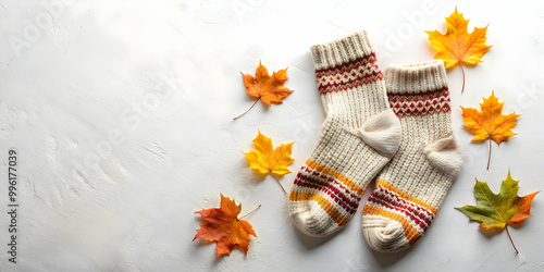 Cozy knitted socks with autumn leaves on white background, autumn, leaves, cozy, knitted, socks, white, background, fall