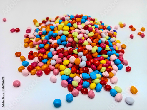 Colorful masterbatch granule, colorful polypropylene polymer granules, cold cutting type granule texture, isolated on white background, for industrial plastic company profile product catalog design