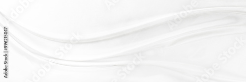 White gray satin texture that is white silver fabric silk panorama background with beautiful soft blur pattern natural.