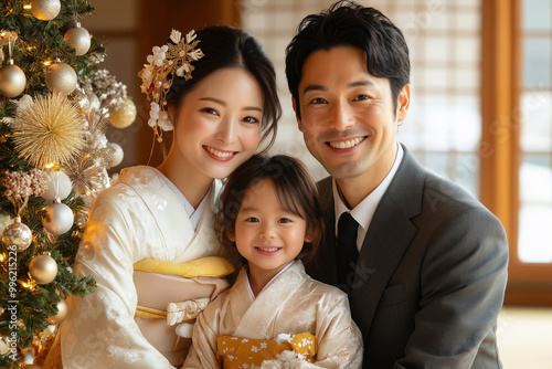 Family Celebration in Traditional Attire by a Decorated Christmas Tree in a Cozy Home Setting photo