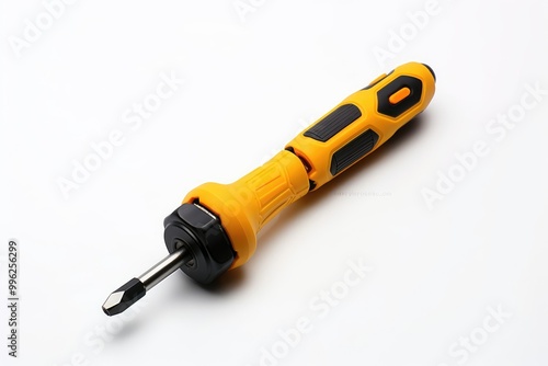 Close-up of a yellow and black magnetic screwdriver on a white surface, highlighting its sleek design and functionality