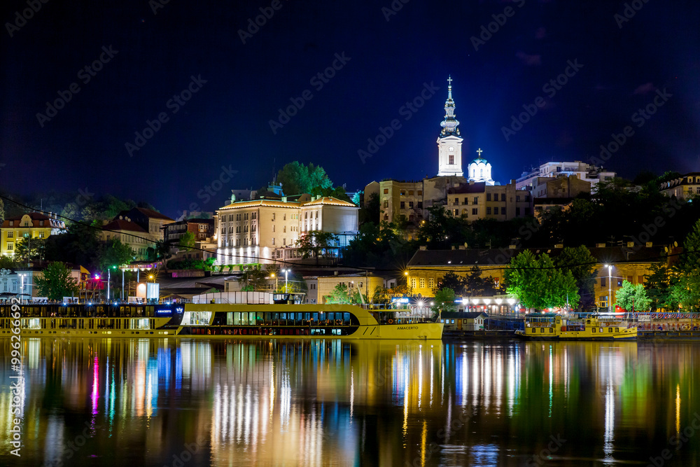 Europe, Serbia, Belgrade, View over the river Sava to New Belgrade, the white city, restaurant and party boats on the river bank, Savski Venac district, New Belgrade Europe, Serbia, Belgrade, View over the river Sava to New Belgrade, the white city, restaurant and party boats on the river bank, Savski Venac district, New Belgrade