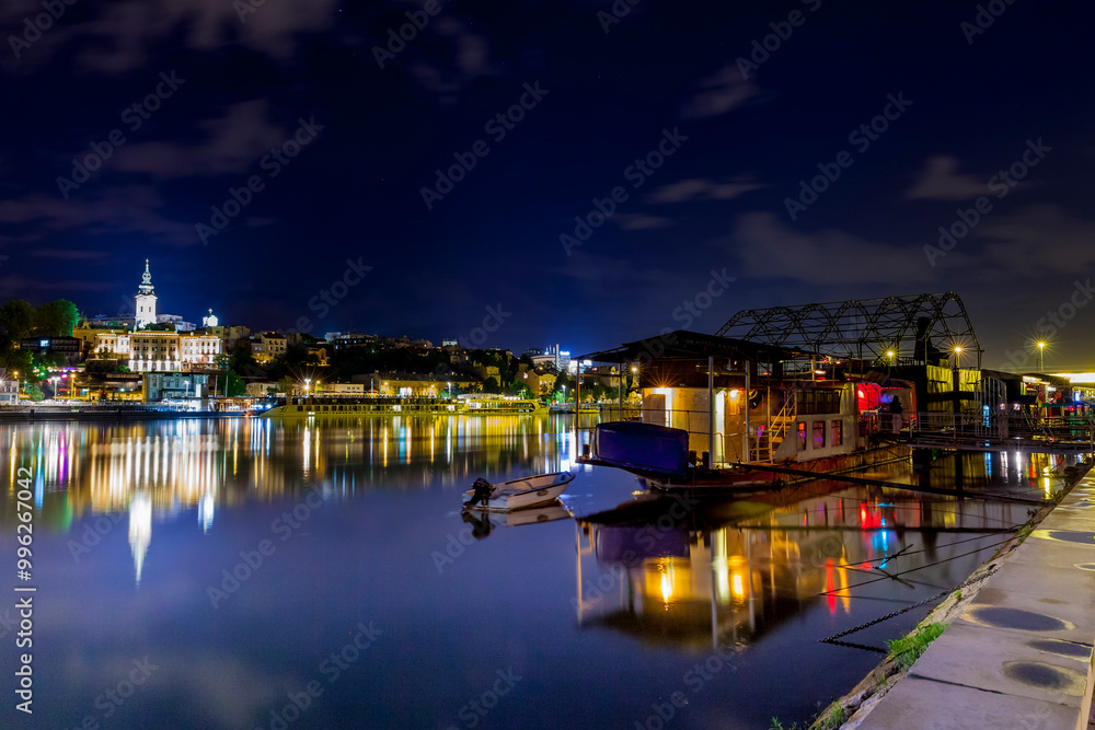 Europe, Serbia, Belgrade, View over the river Sava to New Belgrade, the white city, restaurant and party boats on the river bank, Savski Venac district, New Belgrade Europe, Serbia, Belgrade, View over the river Sava to New Belgrade, the white city, restaurant and party boats on the river bank, Savski Venac district, New Belgrade
